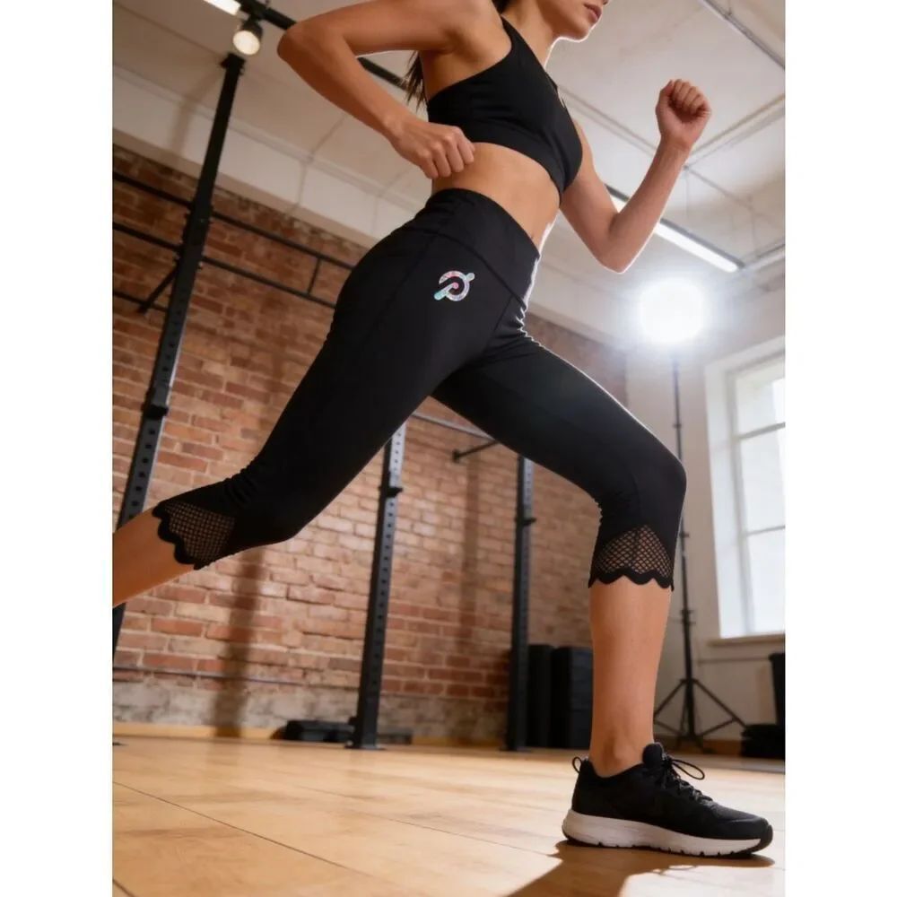 Peloton women’s Black Athletic stretch pants with Mesh and scalloped Trim M